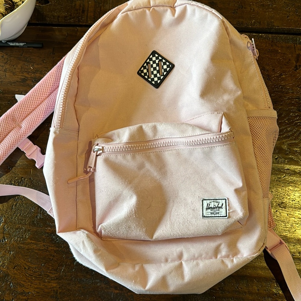 Herschel Pink Backpack in good condition with light use.